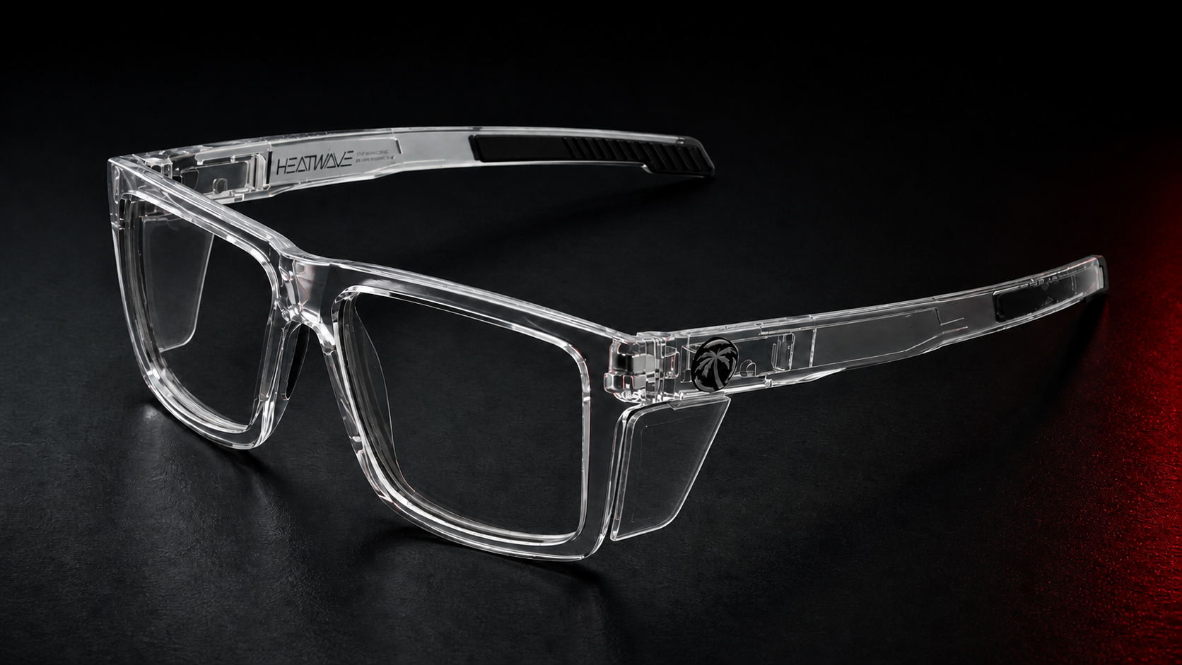 Performance Vise Clear safety glasses with clear side shields on a black studio surface